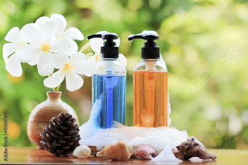 Body care product,shower,shampoo,lotion and Frangipani or plumer photo