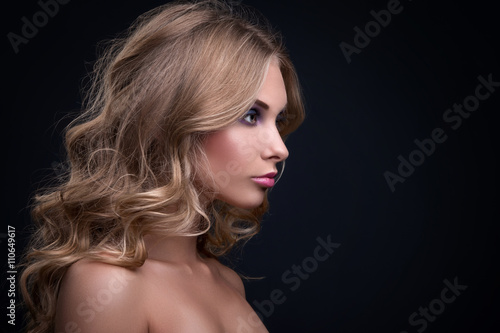 Blonde woman with curly hair