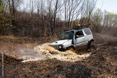 Suzuki Jimny crossing water obstacle