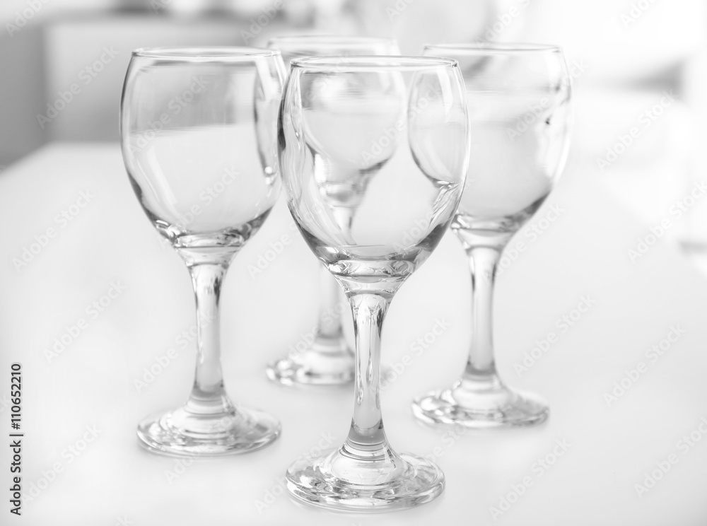 Wineglasses on blurred interior background Wineglasses on blurred interior background