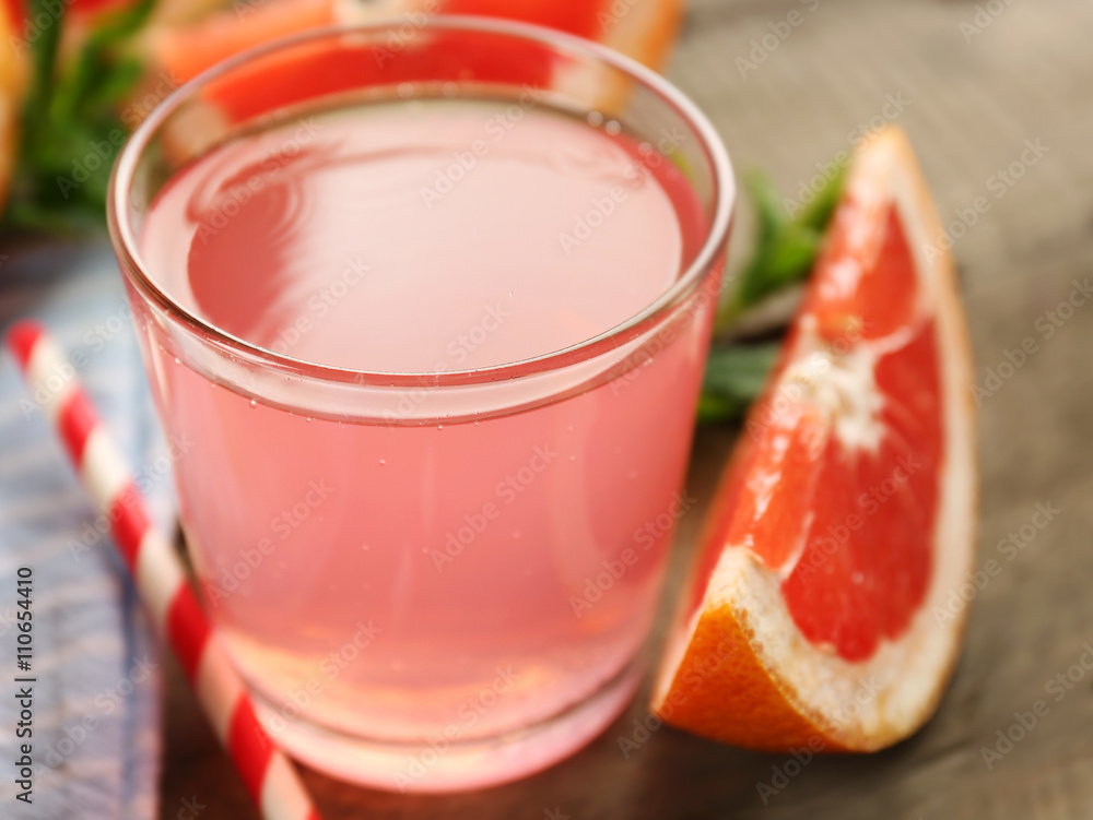 Ripe grapefruits and fresh juice with mint, close up Ripe grapefruits and fresh juice with mint, close up