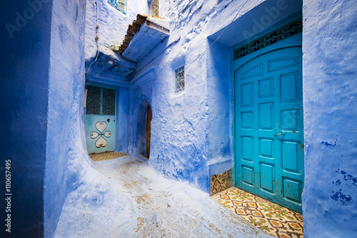 Detail of doors and a window in the town of Chefchaouen, in Morocco