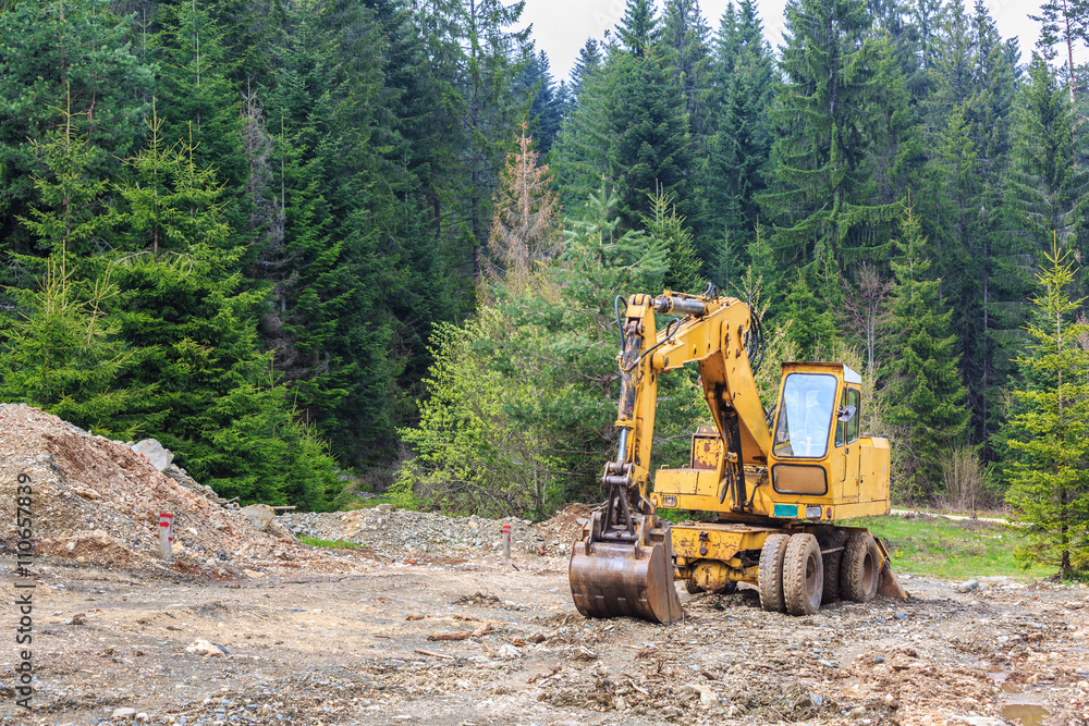 deforestination. building a road through forest deforestination. building a road through forest