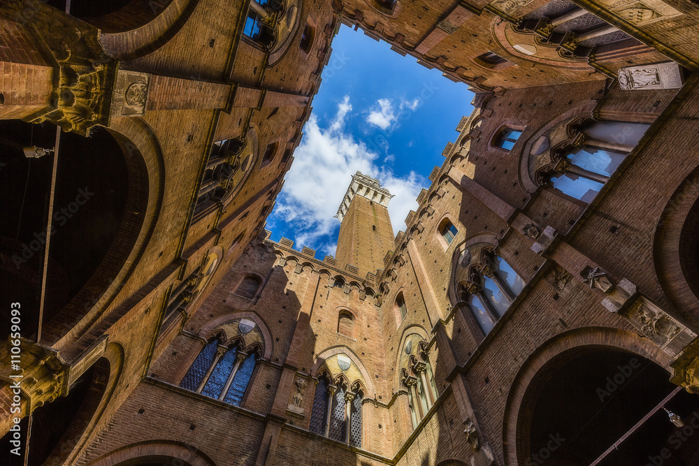 Siena - view of famous Torre del Mangia at Palazzo Pubblico in Siena, Tuscany, Italy