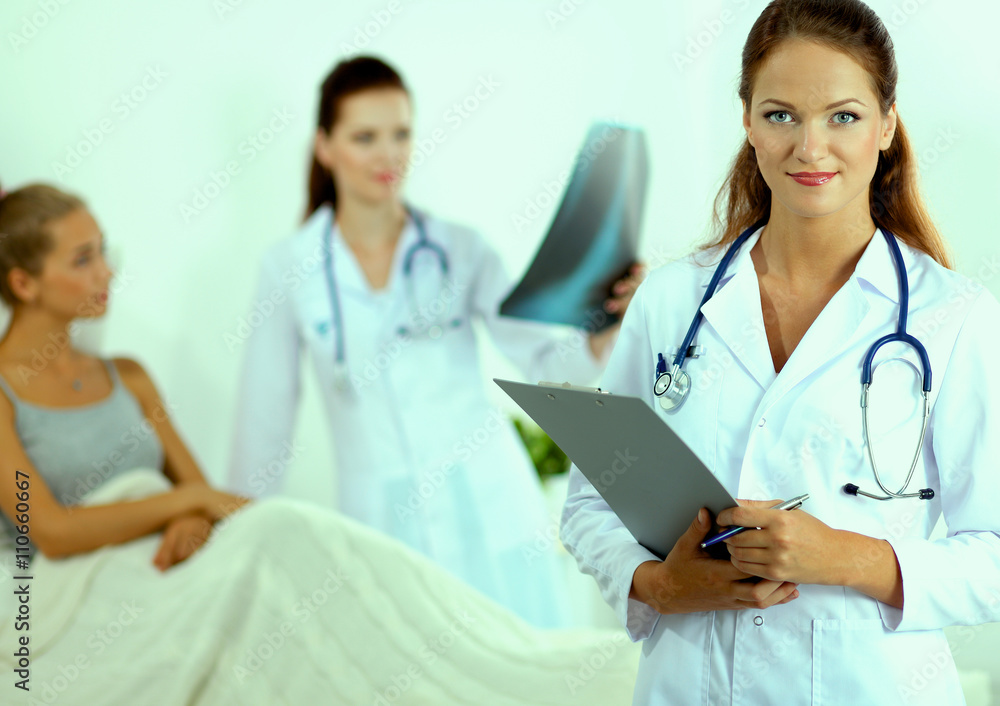 Two young woman doctor , standing in hospital Two young woman doctor , standing in hospital