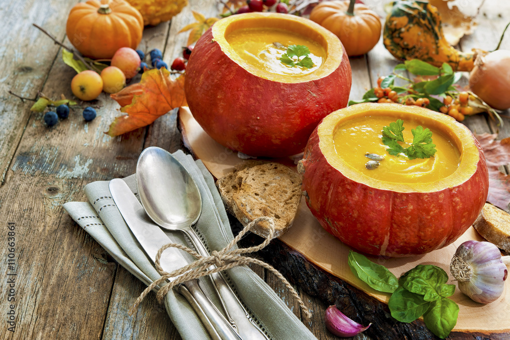 Pumpkin soup on a wooden table Pumpkin soup on a wooden table