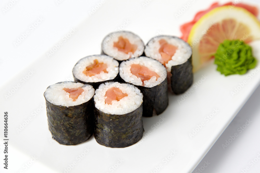 Sushi plates on the white background Sushi plates on the white background