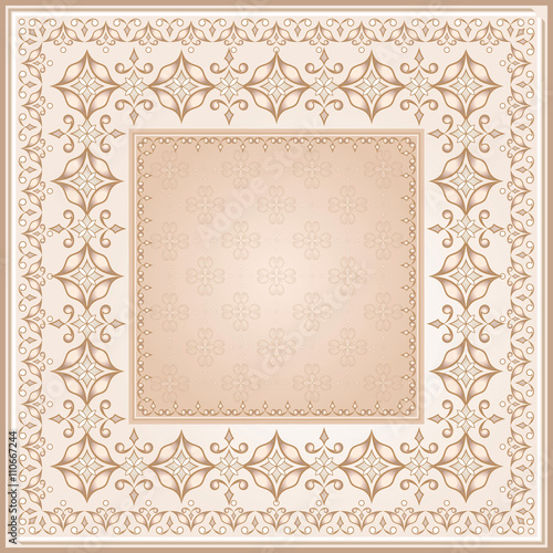 Filigree golden  frame on beige.