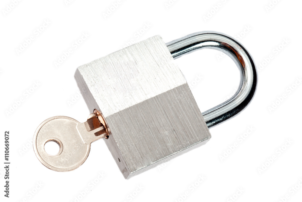 close-up shot of metal padlock and metal keys. close-up shot of metal padlock and metal keys.