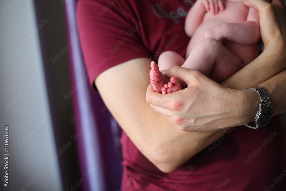 newborn baby feet in parents hands newborn baby feet in parents hands
