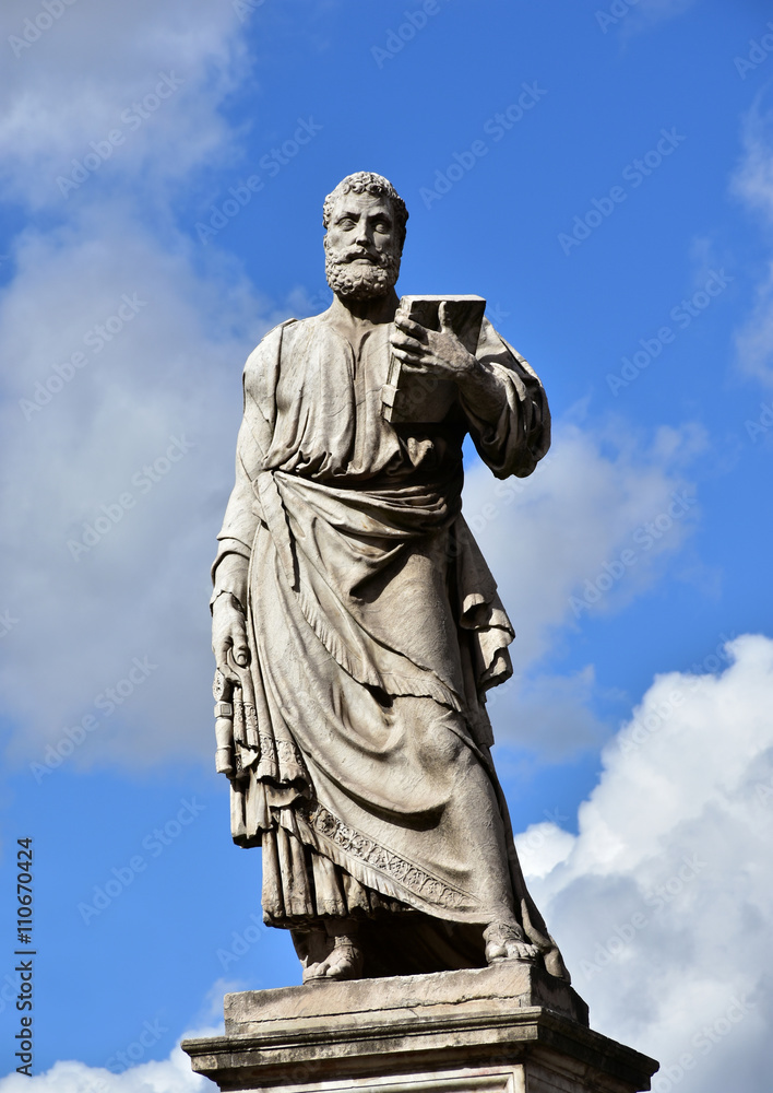 Saint Peter statue with Keys of Heaven. Marble statue of Saint Peter, patron of Rome, at the entrance of Sant'Angelo monumental bridge, created by sculptor Lorenzetto in the 16th century