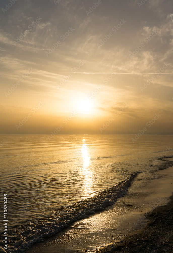 Naklejka premium sunset over the sea beach