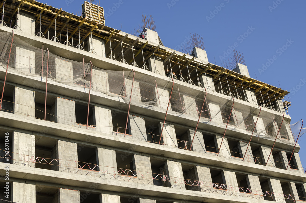 Fototapeta premium The wall is being built monolithic concrete building