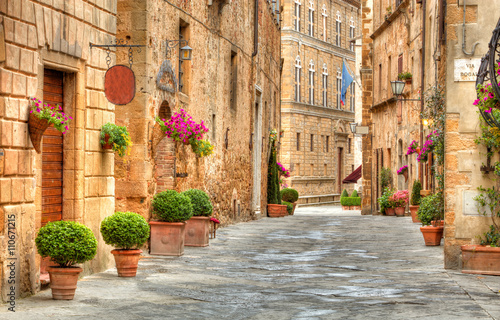 Fototapeta Naklejka Na Ścianę i Meble -  Colorful street in Pienza, Tuscany, Italy