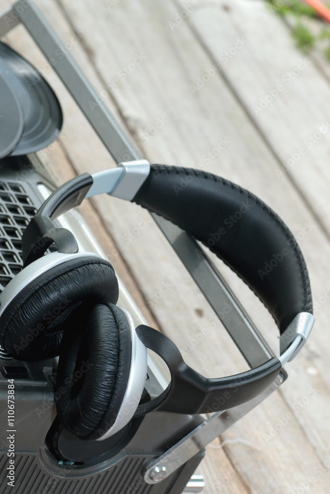 player with headphones on vinyl plates player with headphones on vinyl plates