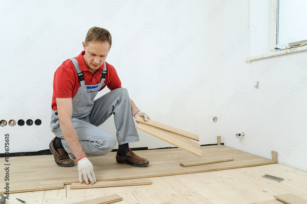 Laying hardwood parquet. Laying hardwood parquet.