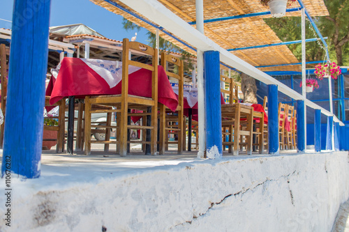 Restaurant on a deck on a sunny greek island © darksider63