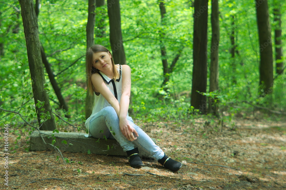 Beautiful young girl in middle of forest. Beautiful young girl in middle of forest.