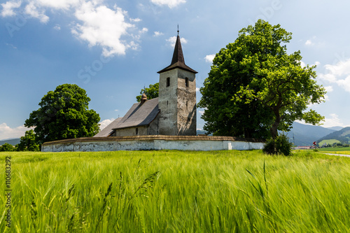 Gothic church in Ludrova village near Ruzomberok in Slovakia photo