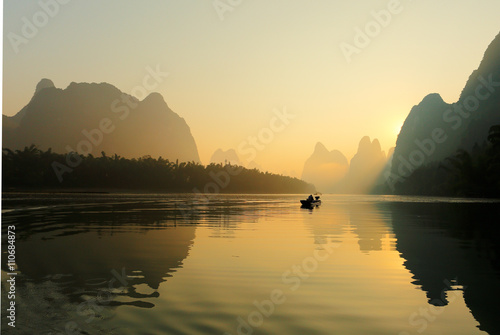 Sunrise at Li River, Xingping, Guilin, China. Xingping is a town in North Guangxi, China. It is 27 kilometers upstream from Yangshuo on the Li River