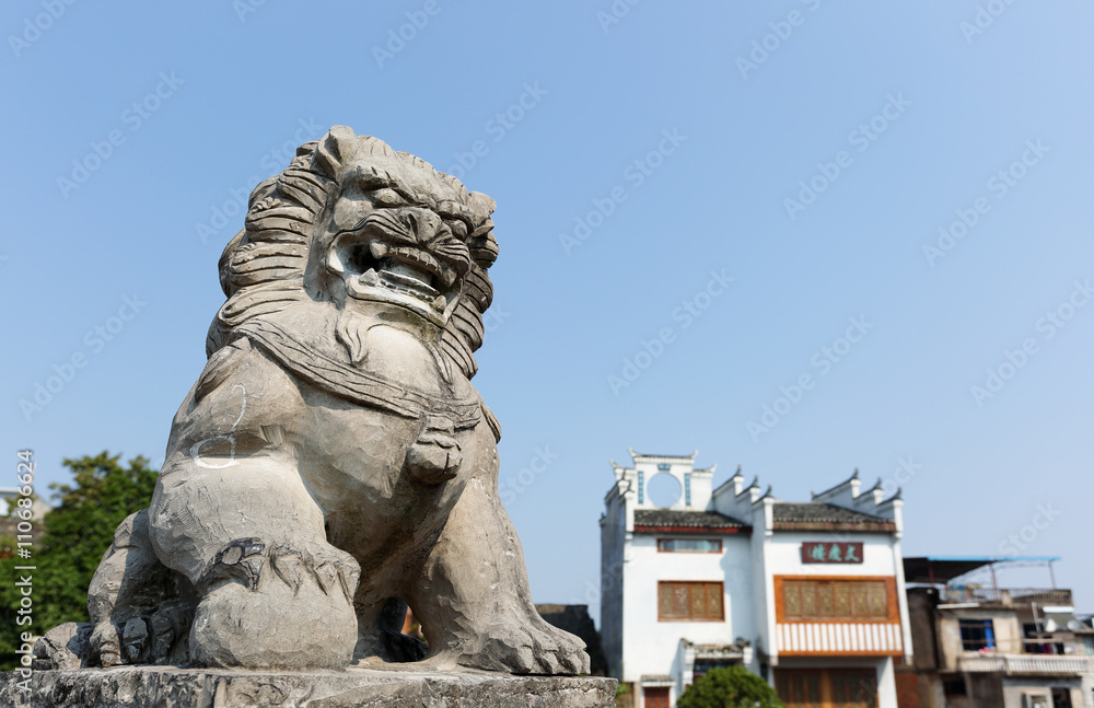 Stone Lion at Daxu, Guilin. Dasu is an ancient town situated at the east bank of the Li River, 23 km (14.3 miles) southeast of Guilin City, China