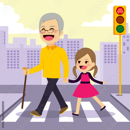 Happy girl helps grandfather crosswalking the street holding hands
