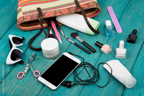 summer women set with straw bag, smartphone with headphones