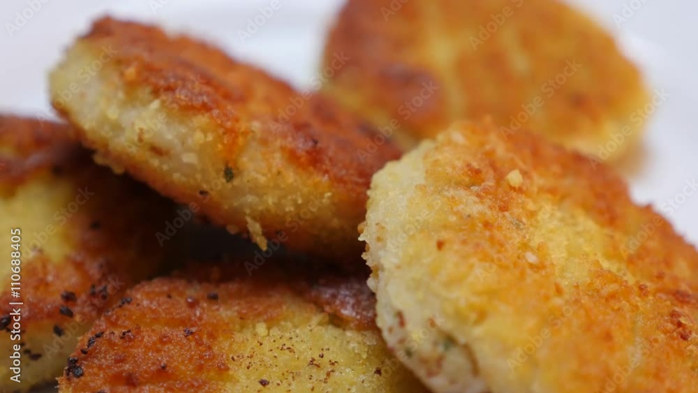 Fried fish burger in vegetable oil pieces close-up food background 4K 2160p 30fps UltraHD tilting video - Fried on oil fish bars on plate served slow tilt 4K 3840X2160 UHD footage Fried fish burger in vegetable oil pieces close-up food background 4K 2160p 30fps UltraHD tilting video - Fried on oil fish bars on plate served slow tilt 4K 3840X2160 UHD footage