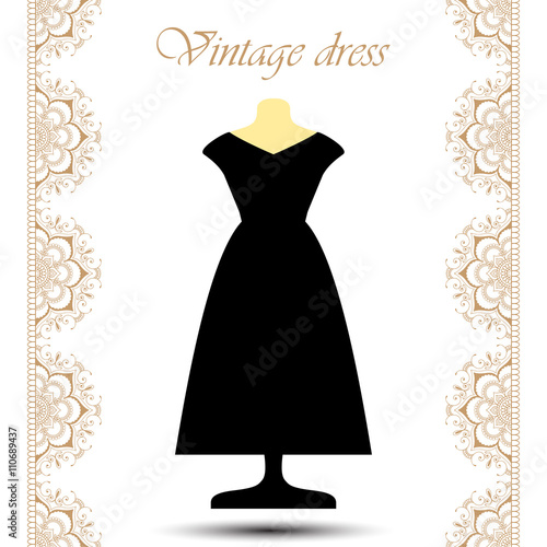 Vintage black long dress on mannequin with line lace borders for icon.