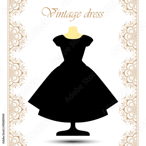 Vintage black fluffy dress on mannequin with line lace borders for icon.