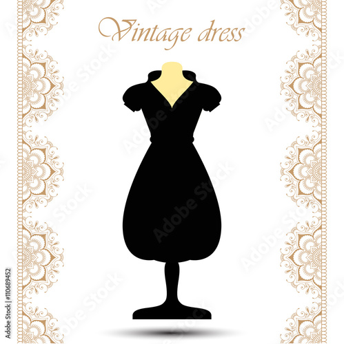 Vintage black short dress on mannequin with line lace borders for icon.