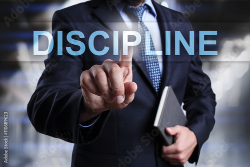 Bild auf Leinwand Businessman is pressing on virtual screen and selecting Discipline