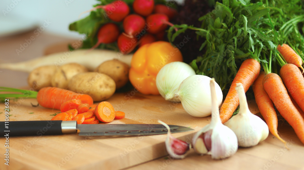Vegetables on the desk in a kitchen Vegetables on the desk in a kitchen