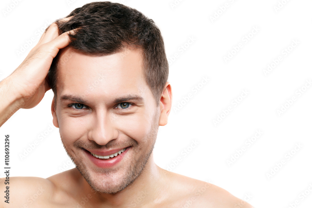 Cute guy is caring of his appearance Cute guy is caring of his appearance