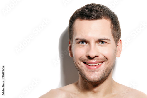 Cheerful guy is expressing positive emotions