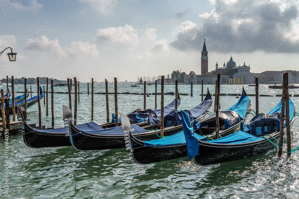 Gondolas moored at the entrance to the Grand Canal