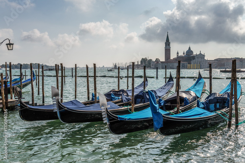 Gondolas moored at the entrance to the Grand Canal