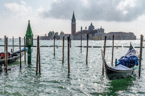 Gondolas moored at the entrance to the Grand Canal