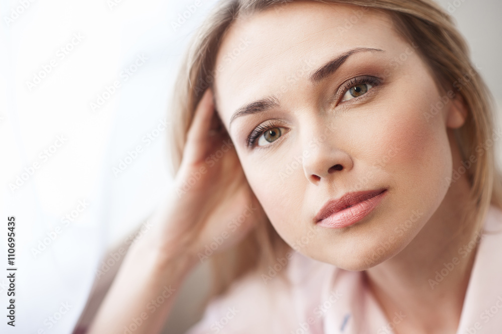 Cheerful young girl is relaxing with enjoyment Cheerful young girl is relaxing with enjoyment