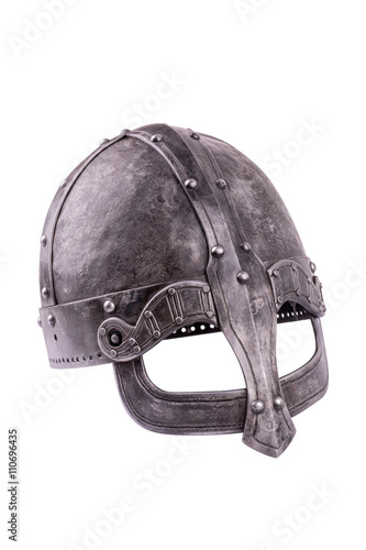 Old forged Viking helmet on a white background.