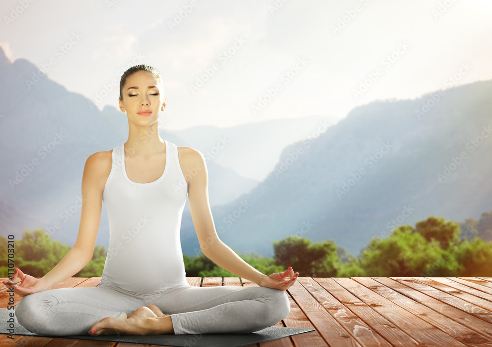 Beautiful young woman doing yoga on nature Beautiful young woman doing yoga on nature