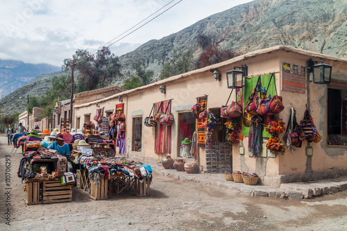 Traditional handmade products for sale on a market in Purmamarca village, Argentina photo