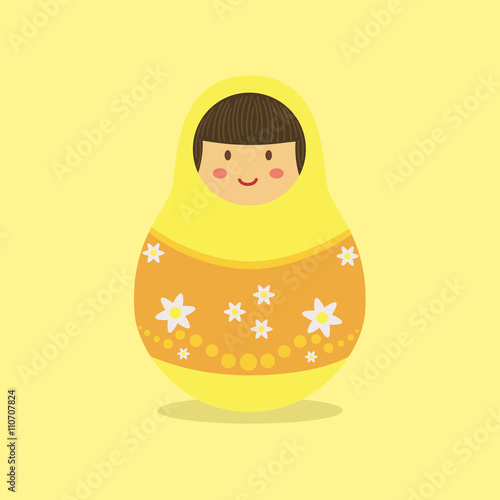 Russian doll with yellow hood and yellow star costume in yellow background.
