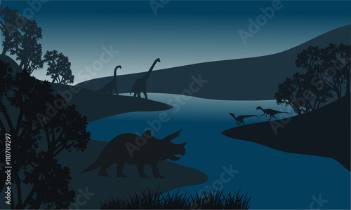 Landscape dinosaur silhouette in river
