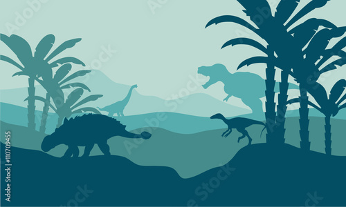 Silhouette of eoraptor and ankylosaurus