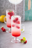 Pink raspberry lemonade in tall glasses