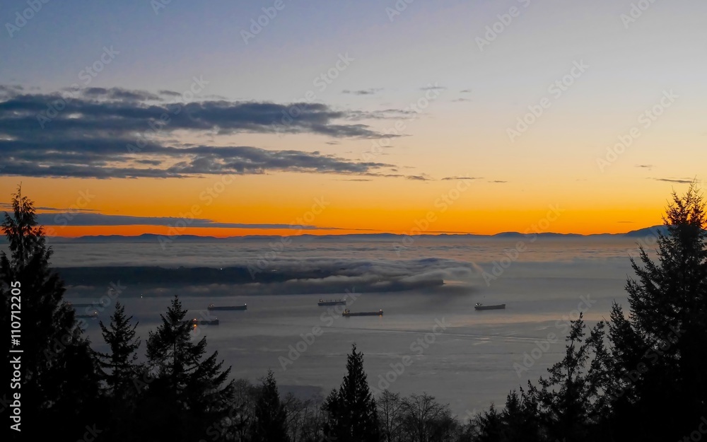 Vancouver City and Lions Gate Bridge Covered with Fog at Dusk. Vancouver, British Columbia, Canada. View from Cypress Mountain. 