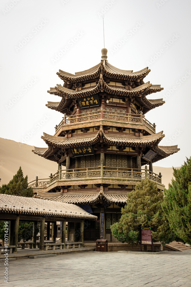 DUNHUANG,CHINA-MARCH 11: Mingyue Pavilion in the mingsha shan s DUNHUANG,CHINA-MARCH 11: Mingyue Pavilion in the mingsha shan s