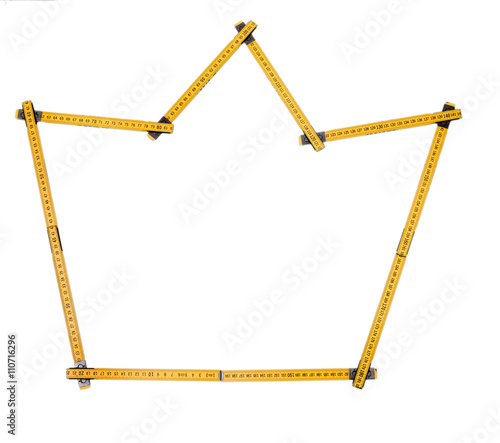 Obraz na płótnie Folding ruler isolated, yellow carpenter's rule with centimeters numbers.
w salonie