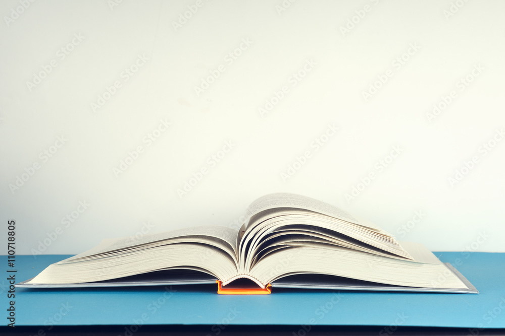 Open book on light table. Back to school. Copy space Open book on light table. Back to school. Copy space